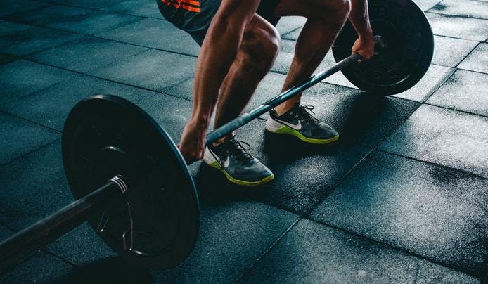 an image of a person lifting weights