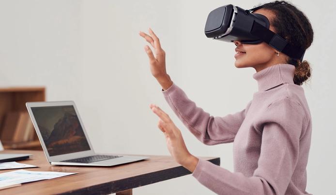 A person looking through a VR headset