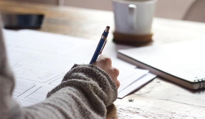 an image of a person working on a test to answer how to improve memory