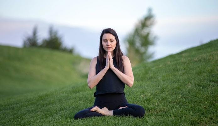 an image of a woman meditating