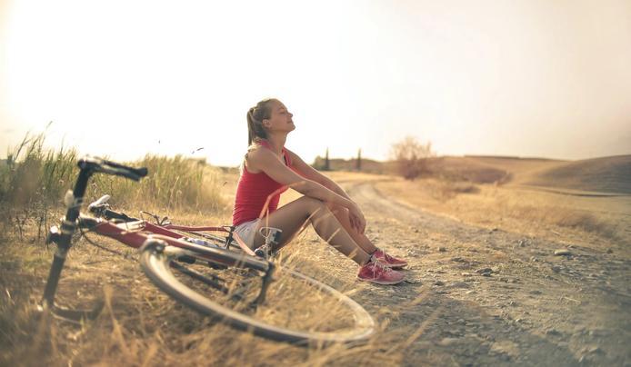 A women taking a break from biking