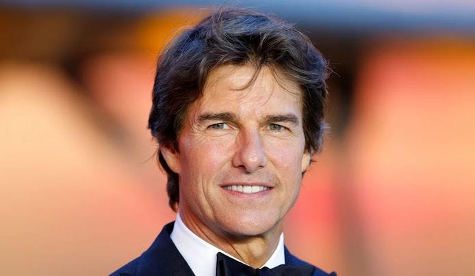 an image of Tom Cruise that is considered to have IQ 125