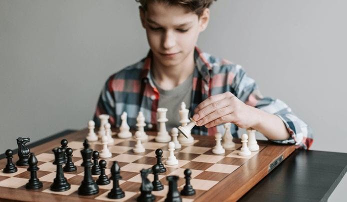 A person playing chess and increases spatial intelligence
